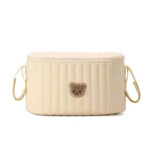 Mini sac à langer beige élégant avec plusieurs compartiments