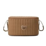 Vue de côté du mini sac à langer marron élégant