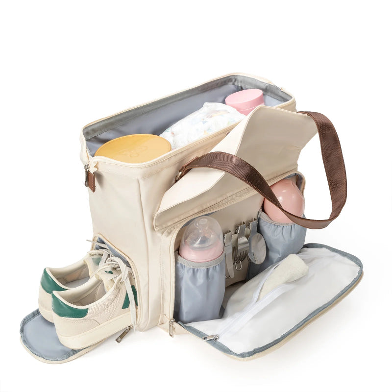 Sac à dos à langer gris pour jeunes parents en déplacement