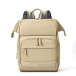 Vue de face d'un sac à langer original beige avec multipoche