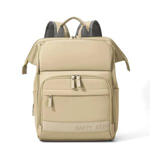Vue de face d'un sac à langer original beige avec multipoche