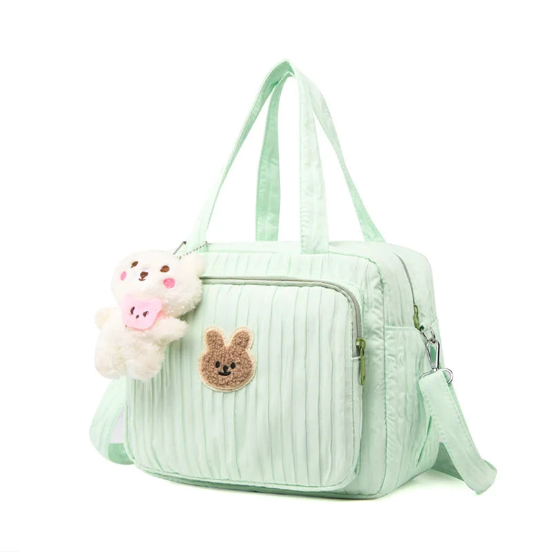 Petit sac à langer élégant avec poches multiples