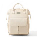Sac à dos à langer beige avec multiples poches pour organisation