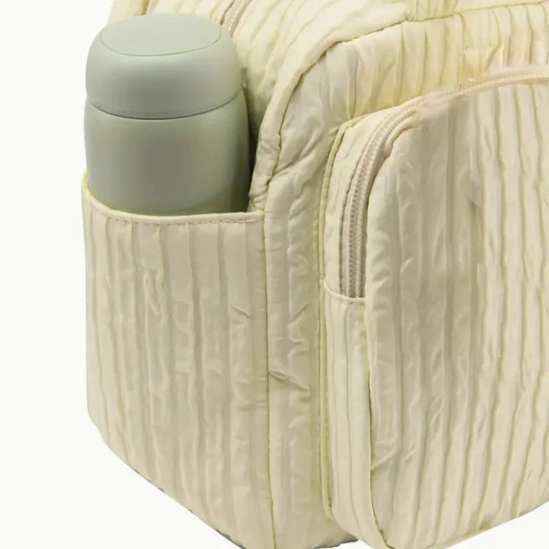 Sac à langer jaune spacieux et fonctionnel