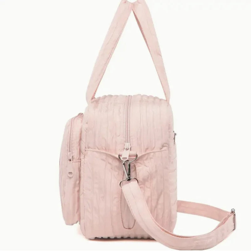 Sac à langer rose fonctionnel avec multiples poches