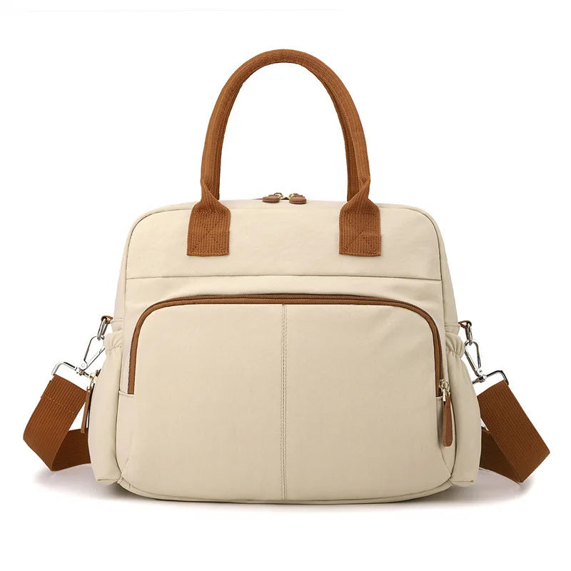 Sac à langer bébé beige en toile imperméable