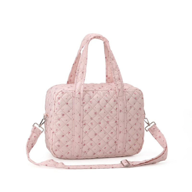 Sac à langer bébé rose avec poches accessoires