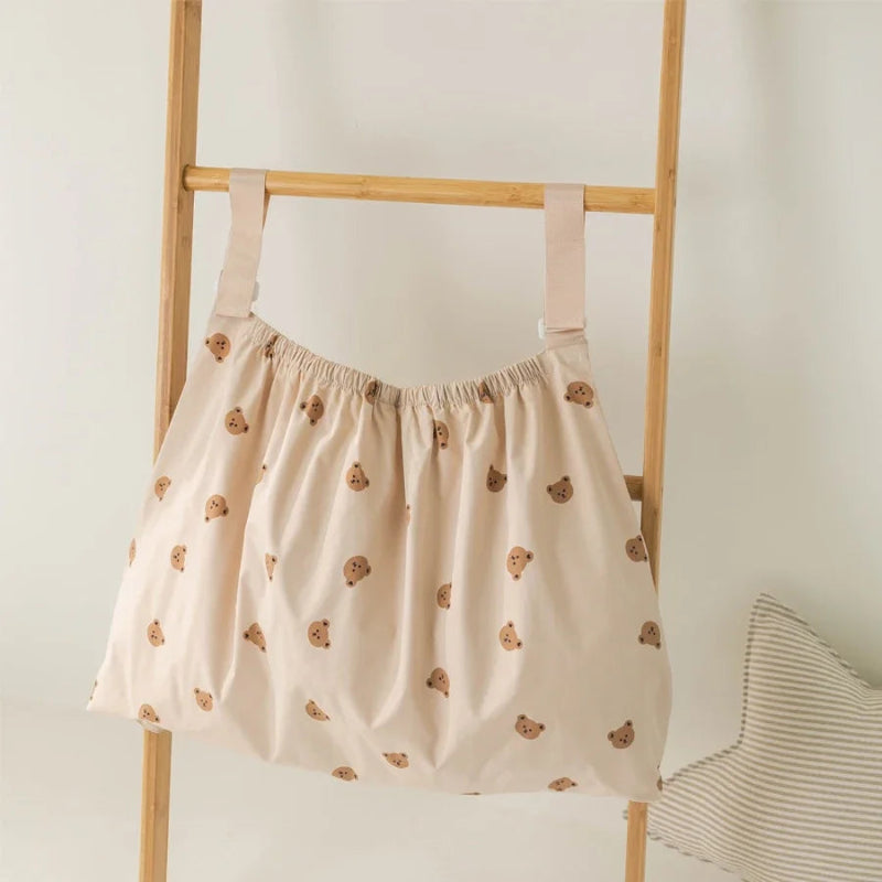 Sac noir pour poussette offrant un rangement optimisé