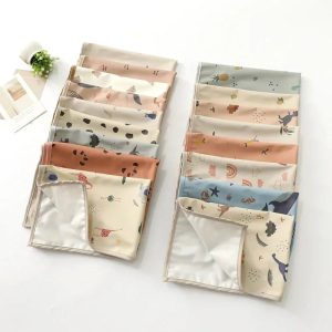 Tapis à langer nomade beige pour bébé